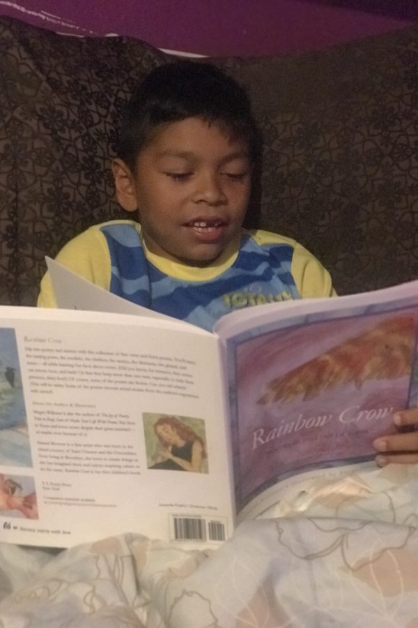 Ramon reading Rainbow Crow